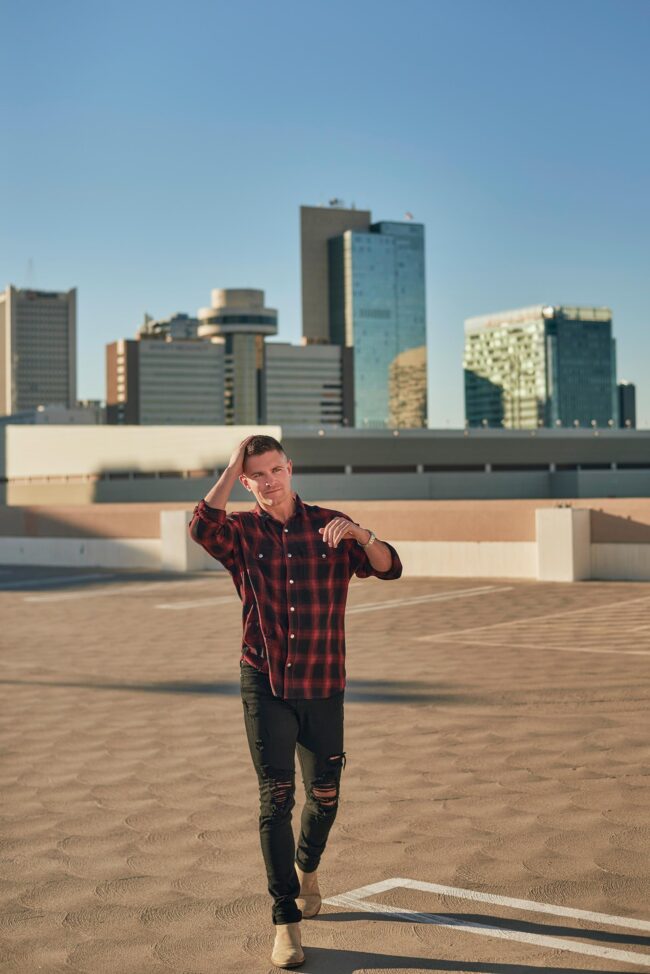 Full-body dating profile photo for men, rooftop lifestyle image for dating apps, natural profile photo for Hinge, Bumble, Tinder, and online dating profiles