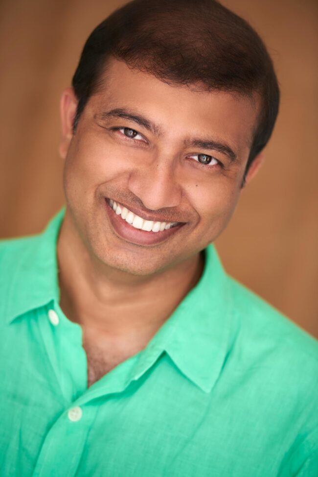 Actor posing for commercial headshots showing versatile expressions, Bright and engaging commercial headshots for aspiring actors, Professional commercial headshots capturing a performer's charisma, Close-up of an actor in a commercial headshots session, Commercial headshots showcasing an actor's friendly demeanor, Actor’s headshot with a natural, approachable look for commercial casting, Vibrant commercial headshots reflecting an actor's on-screen potential, Expressive commercial headshots for a television series audition, Headshot of an actor with a dynamic commercial look, Actor in a studio for commercial headshots highlighting their unique style
