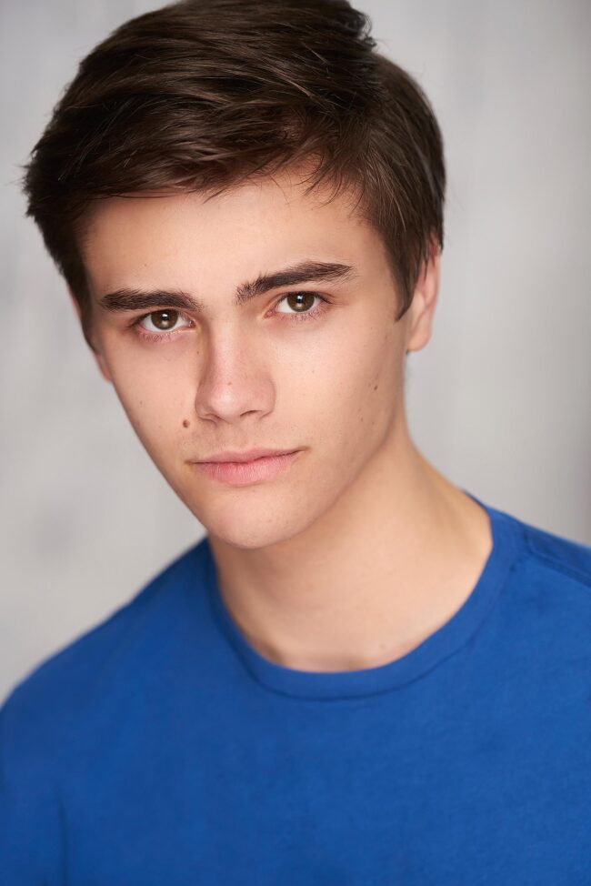 Actor's emotive expression in a theatrical headshots session, Theatrical headshots capturing an actor's dramatic flair, Close-up of an actor's intense gaze in theatrical headshots, Artistically lit theatrical headshots for a stage performer, Aspiring actor's personality shining through in theatrical headshots, Theatrical headshots highlighting an actress's versatility, Expressive and dynamic theatrical headshots for a portfolio, Black and white theatrical headshots showcasing an actor's intensity, Young actor's vibrant energy captured in theatrical headshots, Theatrical headshots reflecting a performer's unique character