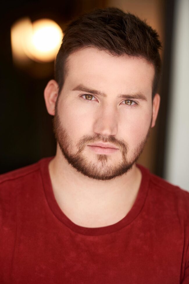 Actor's emotive expression in a theatrical headshots session, Theatrical headshots capturing an actor's dramatic flair, Close-up of an actor's intense gaze in theatrical headshots, Artistically lit theatrical headshots for a stage performer, Aspiring actor's personality shining through in theatrical headshots, Theatrical headshots highlighting an actress's versatility, Expressive and dynamic theatrical headshots for a portfolio, Black and white theatrical headshots showcasing an actor's intensity, Young actor's vibrant energy captured in theatrical headshots, Theatrical headshots reflecting a performer's unique character