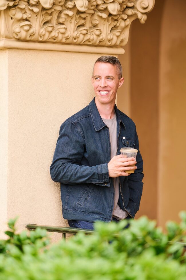 Natural lifestyle dating photo for men, casual outdoor portrait with coffee for online dating profiles, approachable image for Hinge, Bumble, Tinder, and matchmaking platforms