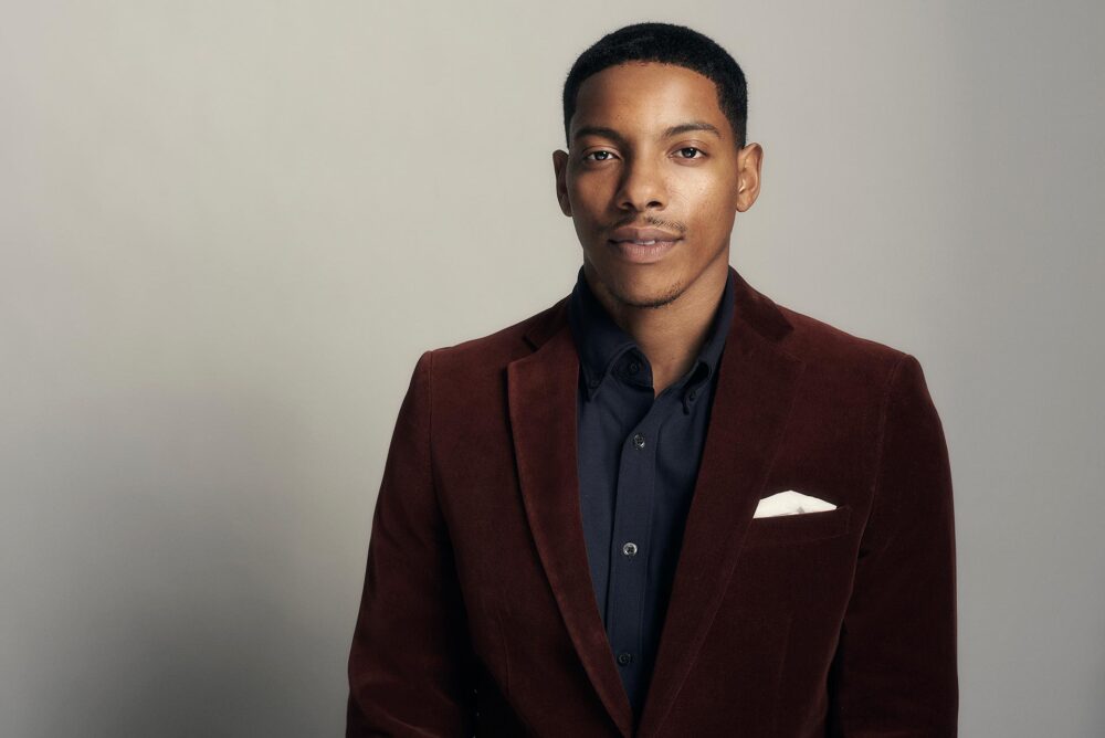 Polished dating profile picture for men in San Francisco, Studio portrait of a man in a burgundy blazer for dating apps, Confident online dating photo for men using Hinge Bumble and Tinder, Professional dating app photographer San Francisco portrait with clean modern styling.