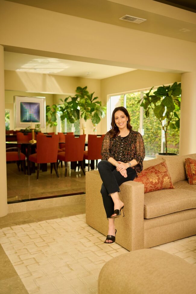 Realtor lifestyle photo in Los Angeles, professional woman seated in a home interior, polished image for realtor website, Zillow profile, social media, marketing, and personal branding
