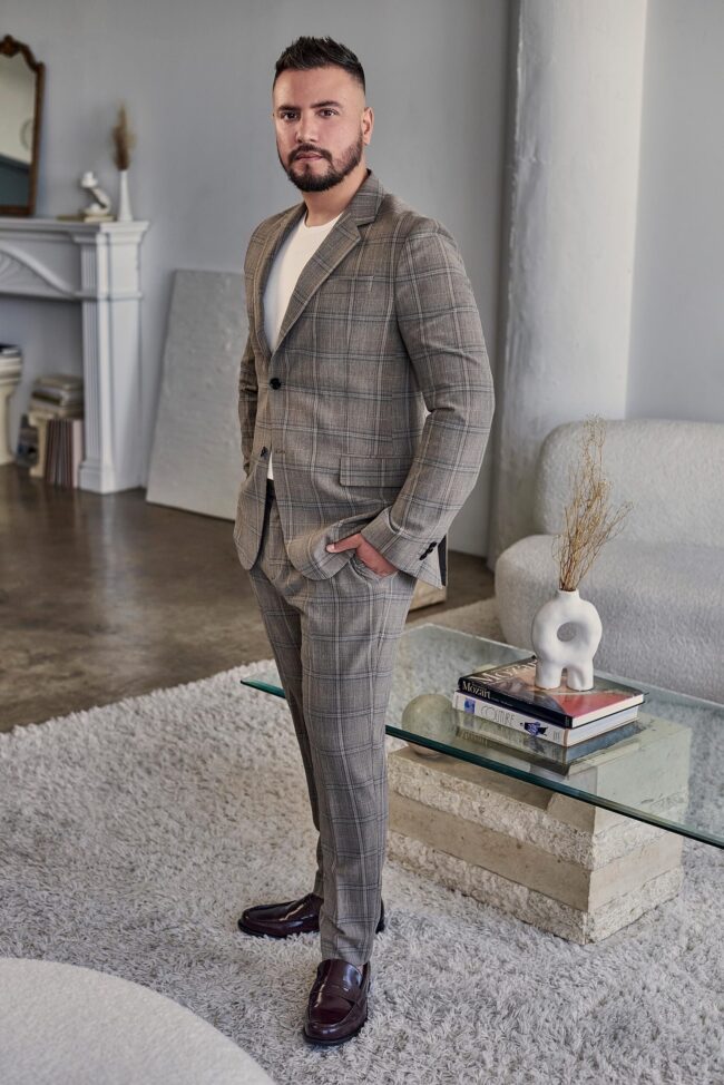 Realtor branding photo in Los Angeles, professional man in a gray suit photographed in a modern interior, polished image for realtor website, Zillow profile, social media, marketing, and personal branding