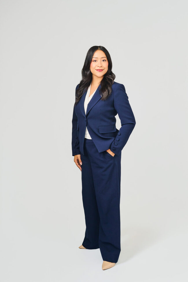 Corporate business portrait in Los Angeles, professional full-body headshot with navy suit, clean studio background, company website and LinkedIn profile image