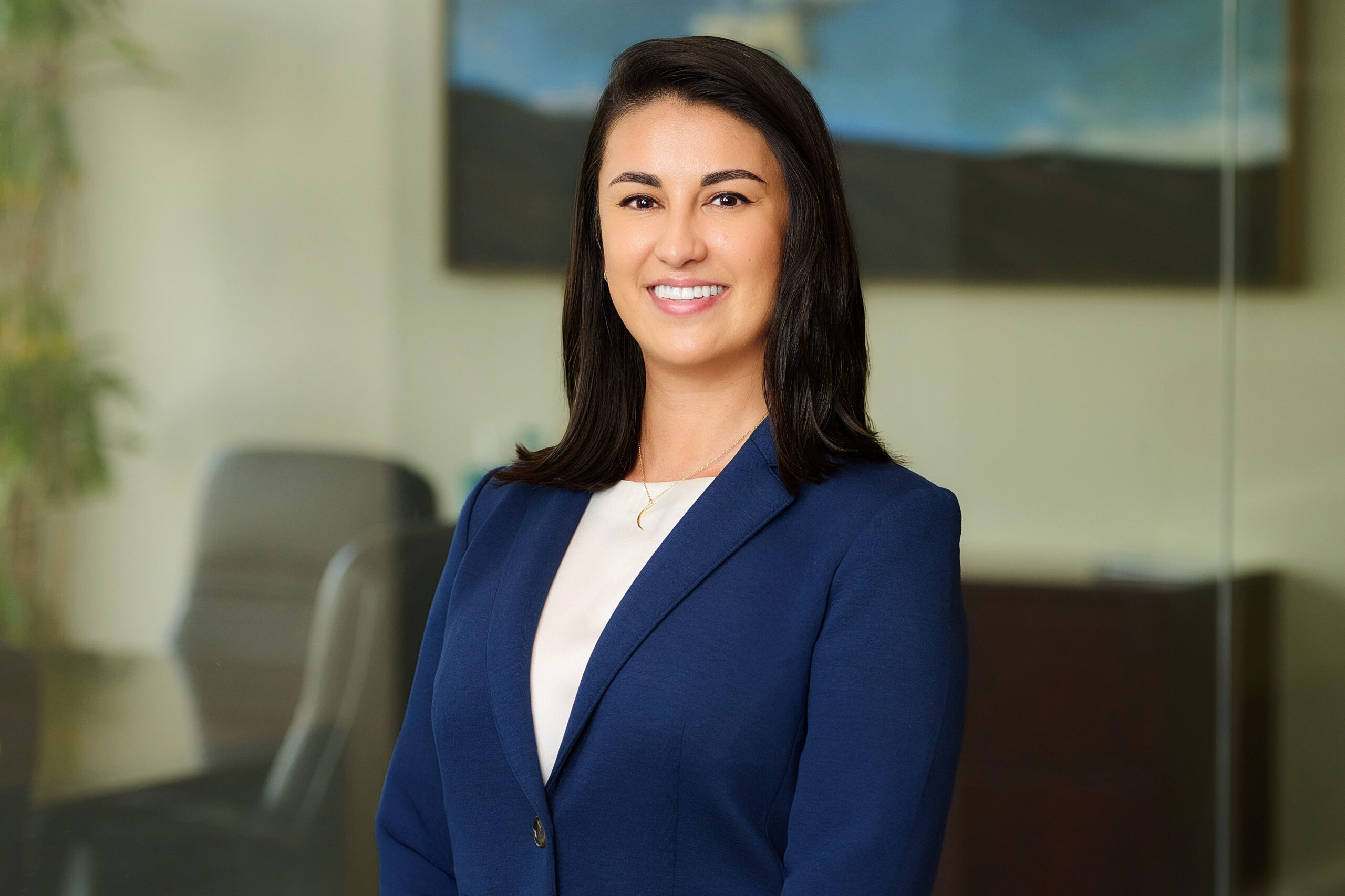 Corporate Office Headshot by Los Angeles Photographer Los Angeles photographer corporate office headshot, woman in a blue blazer photographed in a modern office setting for company websites, team pages, LinkedIn profiles, bios, and professional use