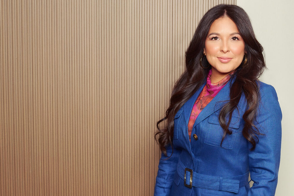 Modern corporate business portrait in Los Angeles, professional woman in blue jacket, clean environmental headshot for LinkedIn, company websites, executive bios, and business profiles