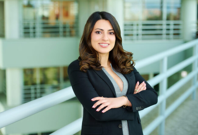 Office corporate headshot in Los Angeles, professional business portrait with black blazer in a modern office setting, LinkedIn and company website profile image